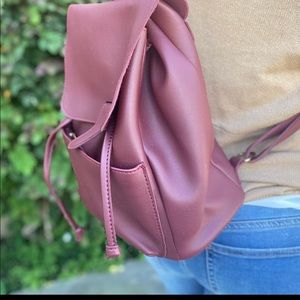 Maroon leather backpack